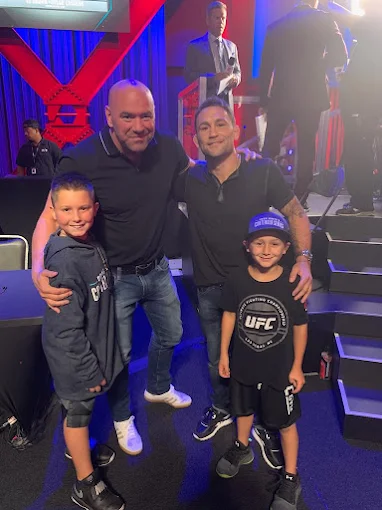 Frankie Edgar with young fans at a UFC event