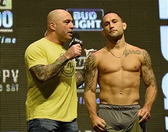 Frankie Edgar on stage at a UFC weigh-in